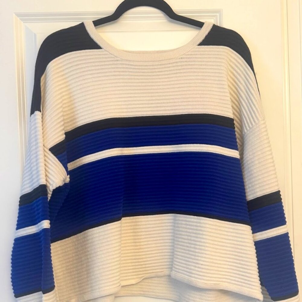 This is a women's DKNY sweater